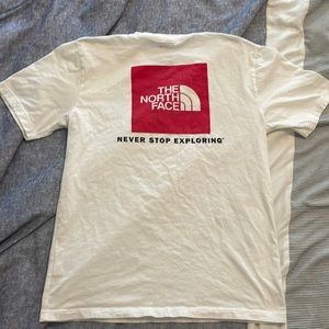 The North Face white t shirt with red logo size medium